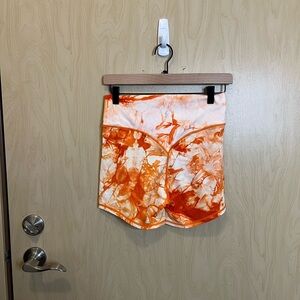 Balance Athleta orange tie dye shorts